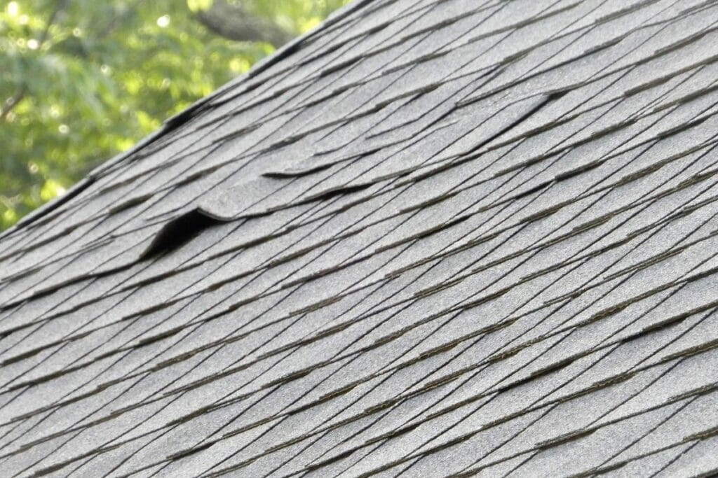 How Long Do Architectural Shingles Last? | North Star Roofing Shingle Damage Visible From Ground